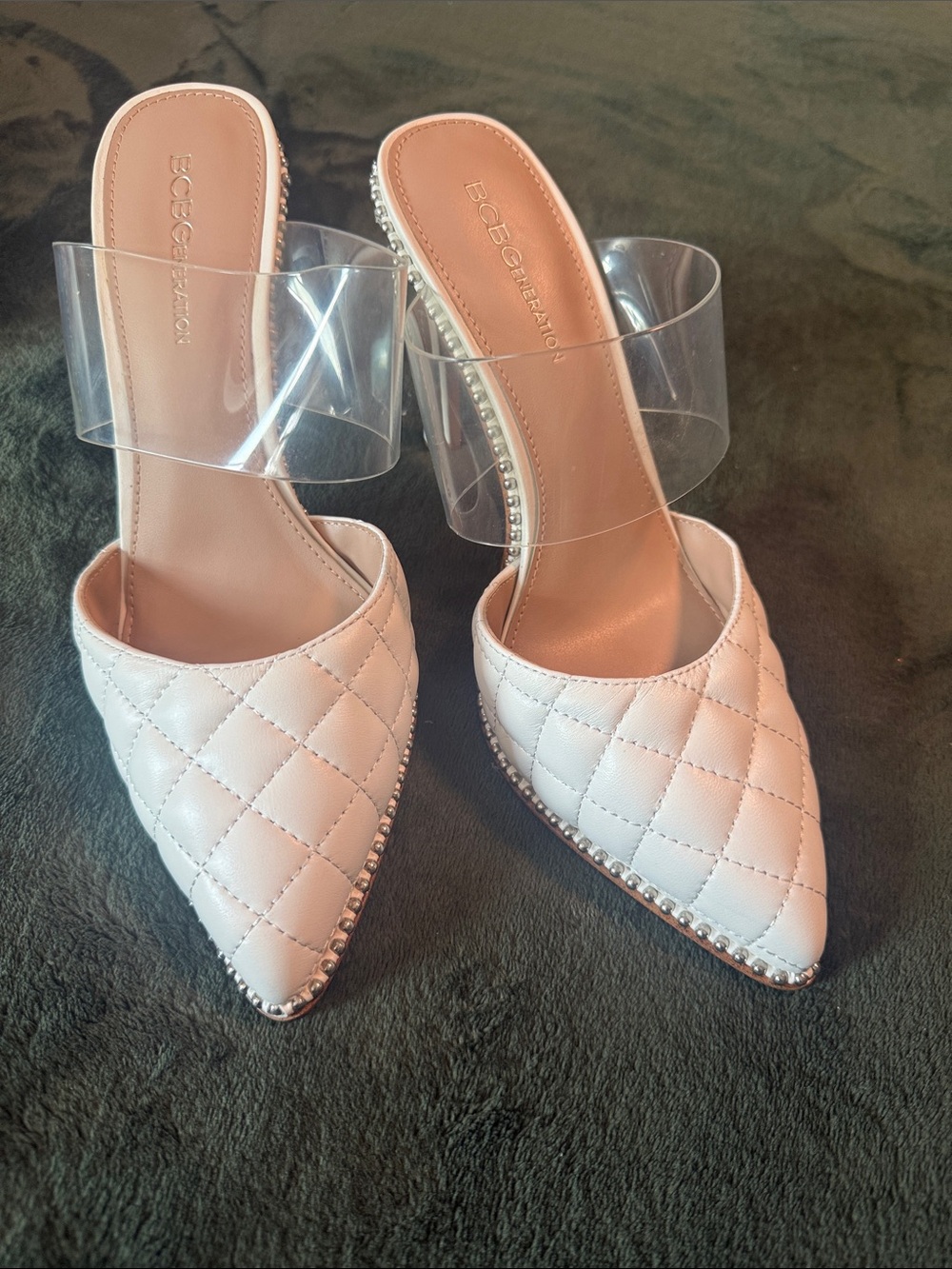 BCBGeneration White Quilted Pointed-Toe Mules with Clear Strap and Stud Trim